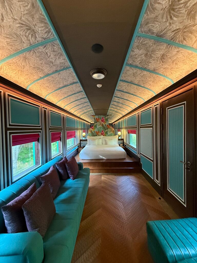 Luxury suite at Intercontinental Khao Yai designed inside a restored 1920s Thai railway carriage by Bill Bensley.