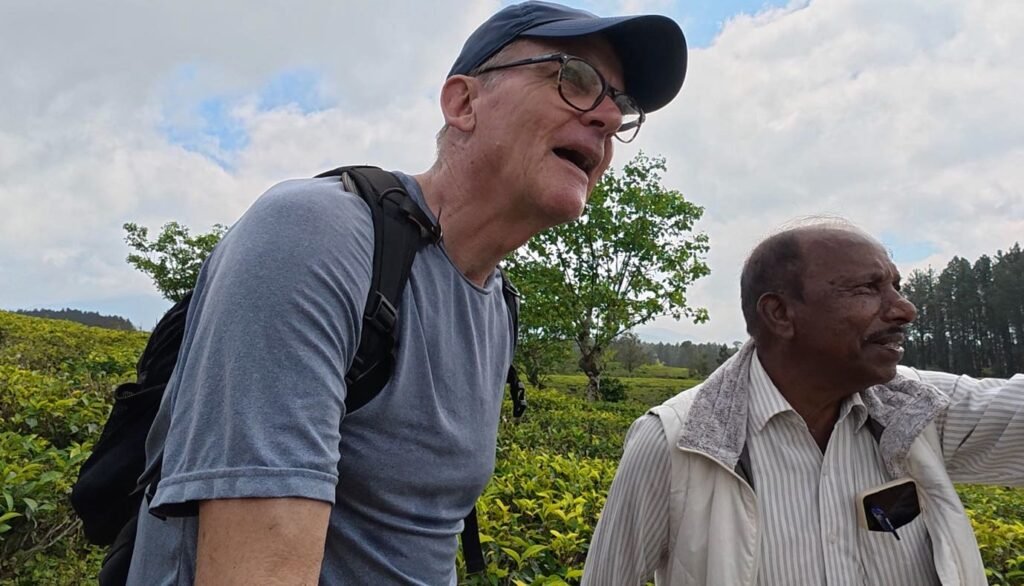 Subramaniyam showing me the best view at Madulkelle Tea & Eco Lodge